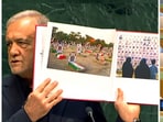 During his speech, Iranian President Masoud Pezeshkian (L) said that they are not terrorists but have been victims of terrorism.