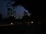 Unlit stretch outside Gate Number one of Aastha Kunj Park in the evening. (Vipin Kumar/HT Photo)