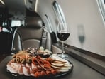 Here's why flight food tastes different.