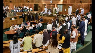 BJP and NC MLAs protest during the autumn session of the assembly session, in Srinagar on Tuesday. (PTI) BJP and NC MLAs protest during the autumn session of the assembly session, in Srinagar on Tuesday. (PTI)