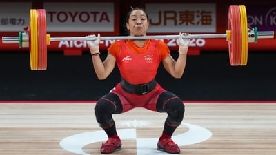 India's Mirabai Chanu competes in the women's 49kg Group A weightlifting final in Nagoya on Wednesday. (PTI) India's Mirabai Chanu competes in the women's 49kg Group A weightlifting final in Nagoya on Wednesday. (PTI)
