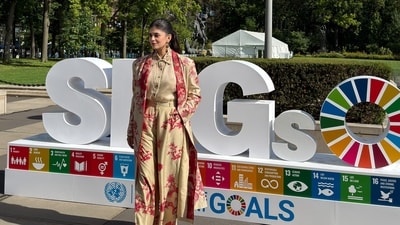 Sanjana Sanghi poses at the United Nations in New York alongside the Sustainable Development Goals display Sanjana Sanghi poses at the United Nations in New York alongside the Sustainable Development Goals display