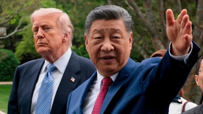FILE - Chinese President Xi Jinping, right, gestures as he greets U.S. President Donald Trump at Zhongnanhai Garden in Beijing, China, Friday, May 15, 2026. (Evan Vucci/Pool Photo via AP, Pool) (Evan Vucci/Pool Reuters via AP) FILE - Chinese President Xi Jinping, right, gestures as he greets U.S. President Donald Trump at Zhongnanhai Garden in Beijing, China, Friday, May 15, 2026. (Evan Vucci/Pool Photo via AP, Pool) (Evan Vucci/Pool Reuters via AP)