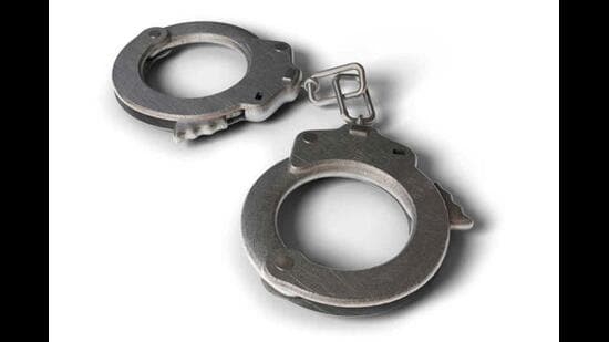 A man wanted in connection with a hand-grenade attack in Gurdaspur was arrested after he allegedly opened fire at a police party during a naka in the Mattewal area on Wednesday.