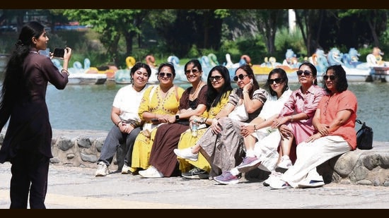 ALL WEATHER FRIENDS: A group seen enjoying the pleasant weather at Sukhna Lake, Chandigarh, on Wednesday. (Keshav Singh/HT)