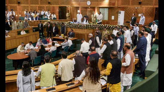 BJP and NC MLAs protest during the autumn session of the assembly session, in Srinagar on Tuesday. (PTI)