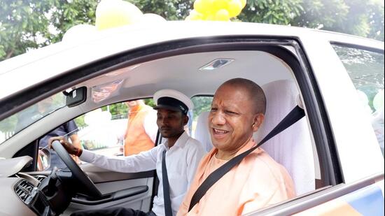 Chief minister Yogi Adityanath during the launch of the Bharat Taxi service in Lucknow on Wednesday. (Deepak Gupta/HT Photo)