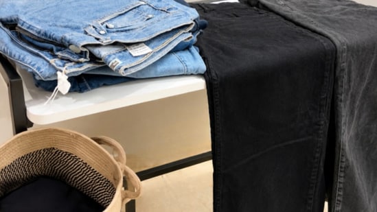 Sorting my denim wardrobe during my three-week laundry audit.