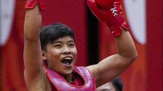 Nagoya: India’s Naorem Roshibina Devi celebrates after defeating Indonesia’s Kusumaningtyas Thani and winning a silver medal in the women’s 60kg wushu semifinal match during the 20th Asian Games, in Nagoya, Japan, Wednesday, Sept. 23, 2026. (PTI Photo/Arun Sharma) (PTI09_23_2026_000191B) (PTI)