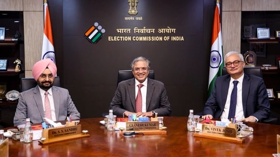Chief Election Commissioner Gyanesh Kumar with Election Commissioners SS Sandhu and Vivek Joshi during a meeting.