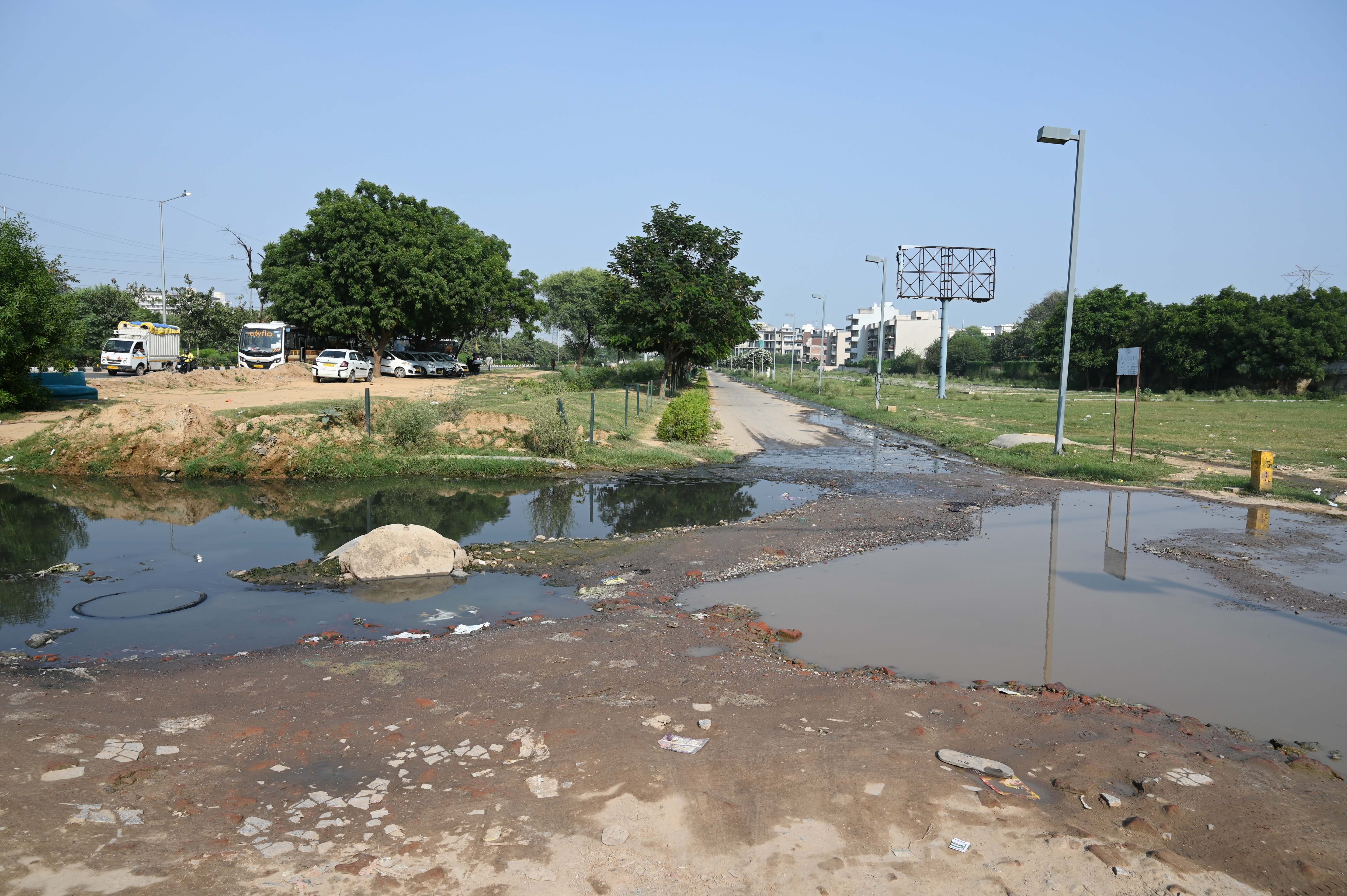 Locals allege sewage overflow accumulate on the main road of Sector 70A, making it difficult to ply on, as seen Tuesday. (Parveen Kumar/Hindustan Times) Locals allege sewage overflow accumulate on the main road of Sector 70A, making it difficult to ply on, as seen Tuesday. (Parveen Kumar/Hindustan Times)
