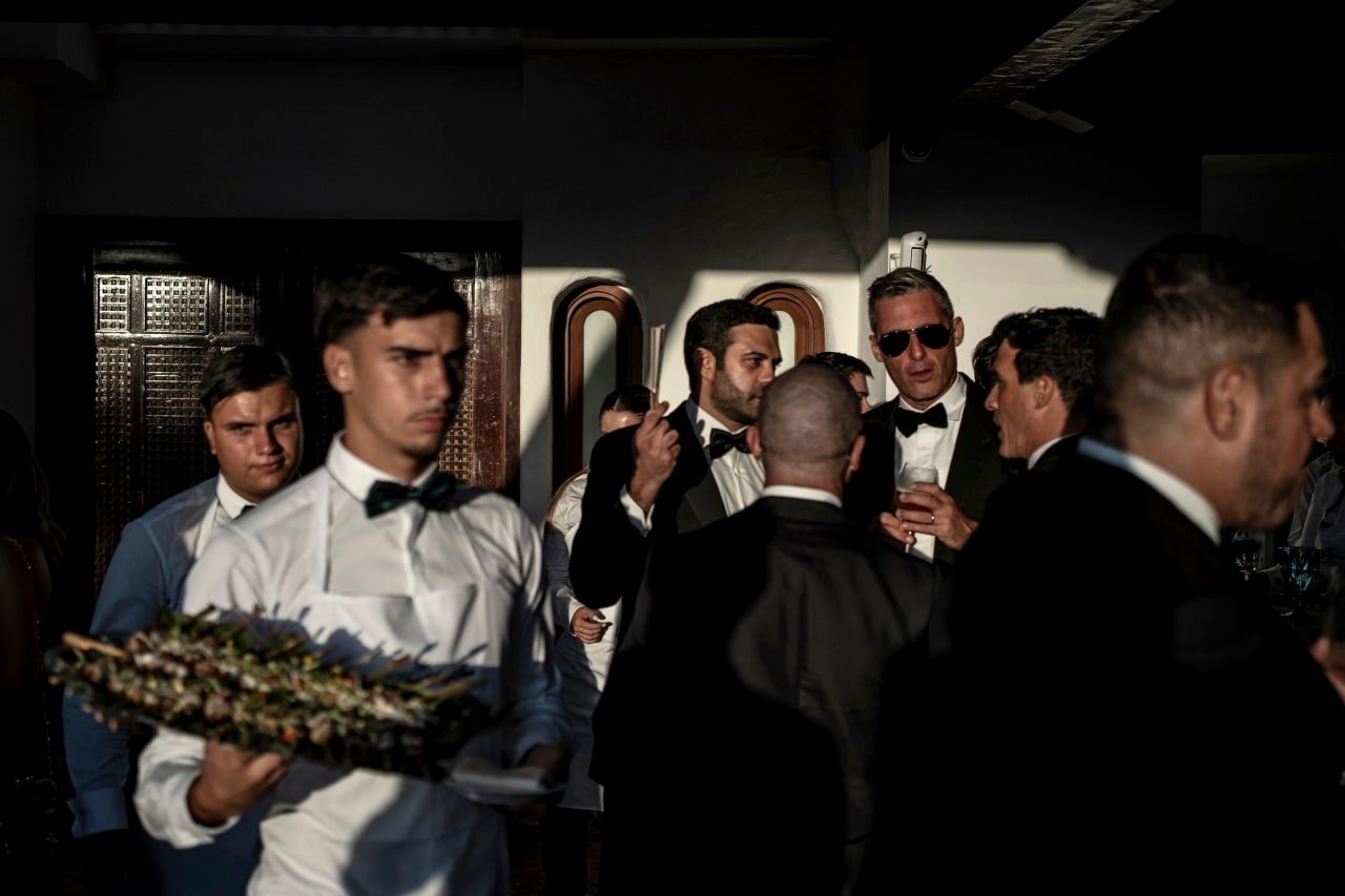 Waiters serving appetizers at an upscale event in Marbella. Waiters serving appetizers at an upscale event in Marbella.