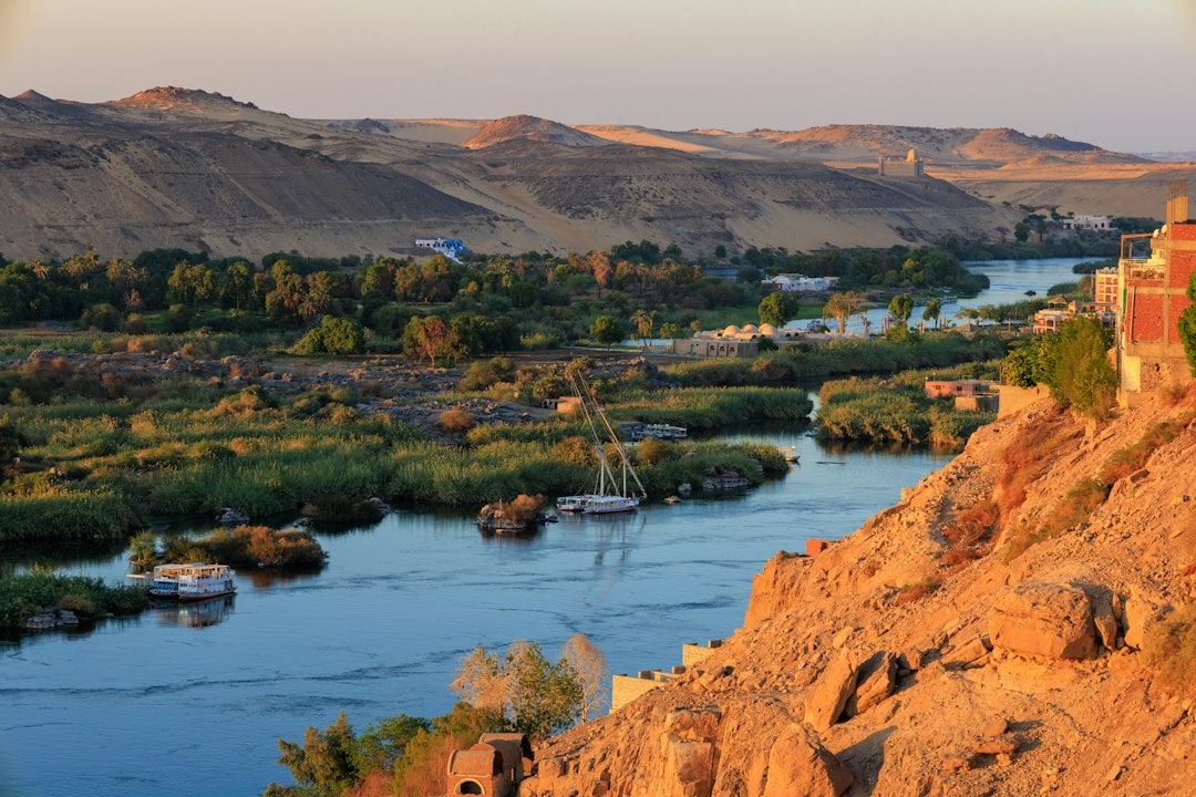 Geoarchaeologist Hader Sheisha's research indicates that a significant ancient Nile branch existed during the Great Pyramid's construction, allowing for boat transportation of materials. This discovery alters perceptions of ancient Egyptian engineering and waterway utilization in pyramid construction. (Representational/Unsplash) Geoarchaeologist Hader Sheisha's research indicates that a significant ancient Nile branch existed during the Great Pyramid's construction, allowing for boat transportation of materials. This discovery alters perceptions of ancient Egyptian engineering and waterway utilization in pyramid construction. (Representational/Unsplash)