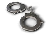 A man wanted in connection with a hand-grenade attack in Gurdaspur was arrested after he allegedly opened fire at a police party during a naka in the Mattewal area on Wednesday.