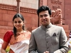Bharatiya Janata Party (BJP) MP Tejasvi Surya with his wife Sivasri Skandaprasad outside Parliament House.(Shrikant Singh/PTI)
