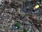 An aerial view of the dumping site close to residential colonies, including Nehru Enclave and Eldeco Greens. (HT Photo) An aerial view of the dumping site close to residential colonies, including Nehru Enclave and Eldeco Greens. (HT Photo)