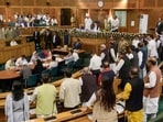 BJP and NC MLAs protest during the autumn session of the assembly session, in Srinagar on Tuesday. (PTI)