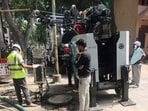 DM Medha Roopam’s visit followed residents’ particular concern about work on sewer lines and electrical infrastructure at some locations. (HT Photo)