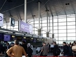 Passengers queue at the terminal hall after flights resumed at Imam Khomeini International Airport.(REUTERS)