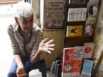 Mobin Beg, 80, sits at his book stall in Hazratganj where he has sold English paperback books for the past 40 years. (Deepak Gupta/HT)