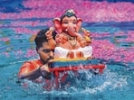 The immersion procession would leave Reay Market and pass through Rameshwar Temple, Globe Cinema, Appa Balwant Chowk, Laxmi Road, and Sevasadan before reaching Lakdi Bridge, where the idols were immersed in the river. (HT FILE)