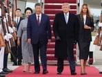 President Donald Trump, first lady Melania Trump, China's President Xi Jinping and his wife Peng Liyuan participate in an arrival ceremony at Joint Base Andrews.(AP Photo/Alex Brandon)