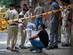 Police personnel investigate the site of an encounter at Amar Colony in southeast Delhi, India, on Tuesday. According to police, an accused identified as Asif, wanted in connection with the alleged sexual assault of a minor near Kalkaji Mandir, was arrested following an exchange of fire with police. 