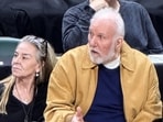 Gregg Popovich with Mary Barth at a San Antonio Spurs game after the latter's divorce from Popovich's former assistant coach Mike Budenholzer.