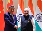 Prime Minister Narendra Modi and China's President Xi Jinping shake hands during a bilateral meeting on the sidelines of the 18th BRICS Summit at the Bharat Mandapam in New Delhi.