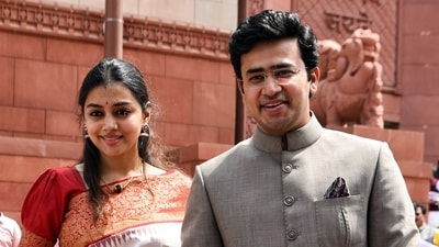 Bharatiya Janata Party (BJP) MP Tejasvi Surya with his wife Sivasri Skandaprasad outside Parliament House. (Shrikant Singh/PTI) Bharatiya Janata Party (BJP) MP Tejasvi Surya with his wife Sivasri Skandaprasad outside Parliament House. (Shrikant Singh/PTI)