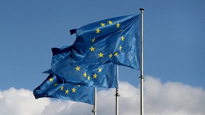 European Union flags fly outside the EU Commission headquarters in Brussels. (REUTERS)