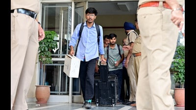 Enforcement Directorate officials leaving the GMADA office in Mohali on Thursday. (Ravi Kumar/HT) Enforcement Directorate officials leaving the GMADA office in Mohali on Thursday. (Ravi Kumar/HT)