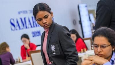 Indian IM Savitha Shri, who has won all her seven games, watches teammate Koneru Humpy’s game in the Fide Chess Olympiad in Samarkand. (FIDE) Indian IM Savitha Shri, who has won all her seven games, watches teammate Koneru Humpy’s game in the Fide Chess Olympiad in Samarkand. (FIDE)