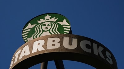 Starbucks CEO Brian Niccol leads turnaround as company plans to close 250 stores. (AP Photo/Lindsey Wasson, File) (AP Photo/Lindsey Wasson) Starbucks CEO Brian Niccol leads turnaround as company plans to close 250 stores. (AP Photo/Lindsey Wasson, File) (AP Photo/Lindsey Wasson)