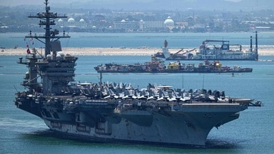 US nuclear-powered aircraft carrier USS Abraham Lincoln (CVN-72) departs Laem Chabang Port, near the city of Pattaya on September 6, 2026. Thousands of US sailors aboard an aircraft carrier departed from Thailand on September 6, AFP journalists said, concluding its first port call following reports of deteriorating living conditions on board after nine months at sea. (Photo by Chanakarn LAOSARAKHAM / AFP) (AFP) US nuclear-powered aircraft carrier USS Abraham Lincoln (CVN-72) departs Laem Chabang Port, near the city of Pattaya on September 6, 2026. Thousands of US sailors aboard an aircraft carrier departed from Thailand on September 6, AFP journalists said, concluding its first port call following reports of deteriorating living conditions on board after nine months at sea. (Photo by Chanakarn LAOSARAKHAM / AFP) (AFP)