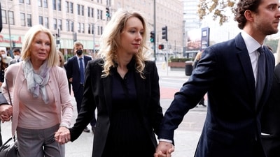 Theranos founder Elizabeth Holmes arrives with her family and partner Billy Evans to be sentenced on her convictions for defrauding investors in the blood testing startup at the federal courthouse in San Jose, California, U.S., November 18, 2022. (REUTERS)
