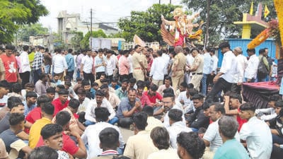 The death of man during Ganpati immersion procession in Ahilyanagar has triggered a controversy, with NCP MLA Sangram Jagtap and residents alleging that he died following police lathi-charge. (HT) The death of man during Ganpati immersion procession in Ahilyanagar has triggered a controversy, with NCP MLA Sangram Jagtap and residents alleging that he died following police lathi-charge. (HT)