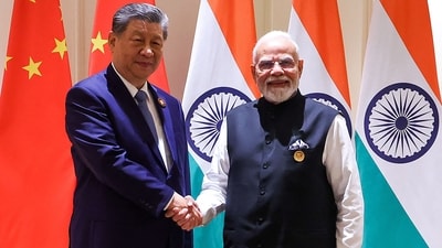 Prime Minister Narendra Modi and China's President Xi Jinping shake hands during a bilateral meeting on the sidelines of the 18th BRICS Summit at the Bharat Mandapam in New Delhi. (AFP) Prime Minister Narendra Modi and China's President Xi Jinping shake hands during a bilateral meeting on the sidelines of the 18th BRICS Summit at the Bharat Mandapam in New Delhi. (AFP)