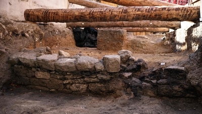 The wall, which had been buried four metres deep in a courtyard of the Hotel-Dieu hospital, the oldest in the French Capital, is barely a metre high. (AFP) The wall, which had been buried four metres deep in a courtyard of the Hotel-Dieu hospital, the oldest in the French Capital, is barely a metre high. (AFP)