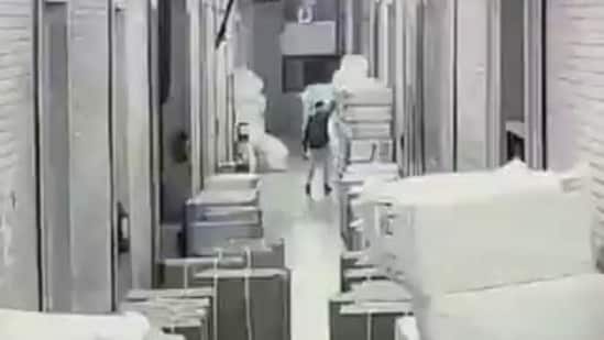 Vinod Pandit Savle, 33, was captured on camera starting the fire.