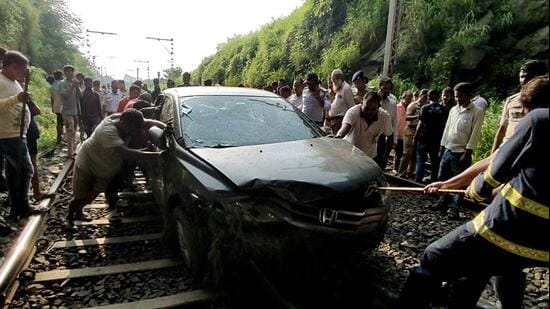 Navi Mumbai, India - Sept. 24, 2026:Honda City Plunges Onto Belapur-Uran Railway Tracks near CBD Belapur Station, local train services disrupted at CBD Belapur in Navi Mumbai, India, on Thursday, September 24, 2026. (Photo by Bachchan Kumar/ Hindustan Times) (Hindustan Times)