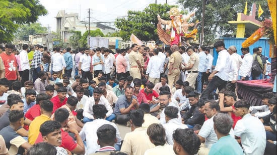 The death of man during Ganpati immersion procession in Ahilyanagar has triggered a controversy, with NCP MLA Sangram Jagtap and residents alleging that he died following police lathi-charge. (HT)