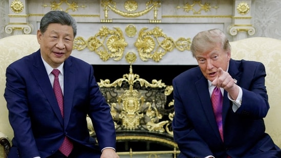 US President Donald Trump meets Chinese President Xi Jinping in the Oval Office at the White House in Washington.