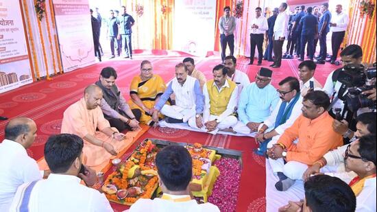 Uttar Pradesh chief minister Yogi Adityanath at a groundbreaking ceremony for two housing schemes in Lucknow on Thursday. (HT PHOTO)
