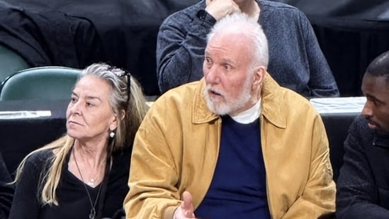 Gregg Popovich with Mary Barth at a San Antonio Spurs game after the latter's divorce from Popovich's former assistant coach Mike Budenholzer.