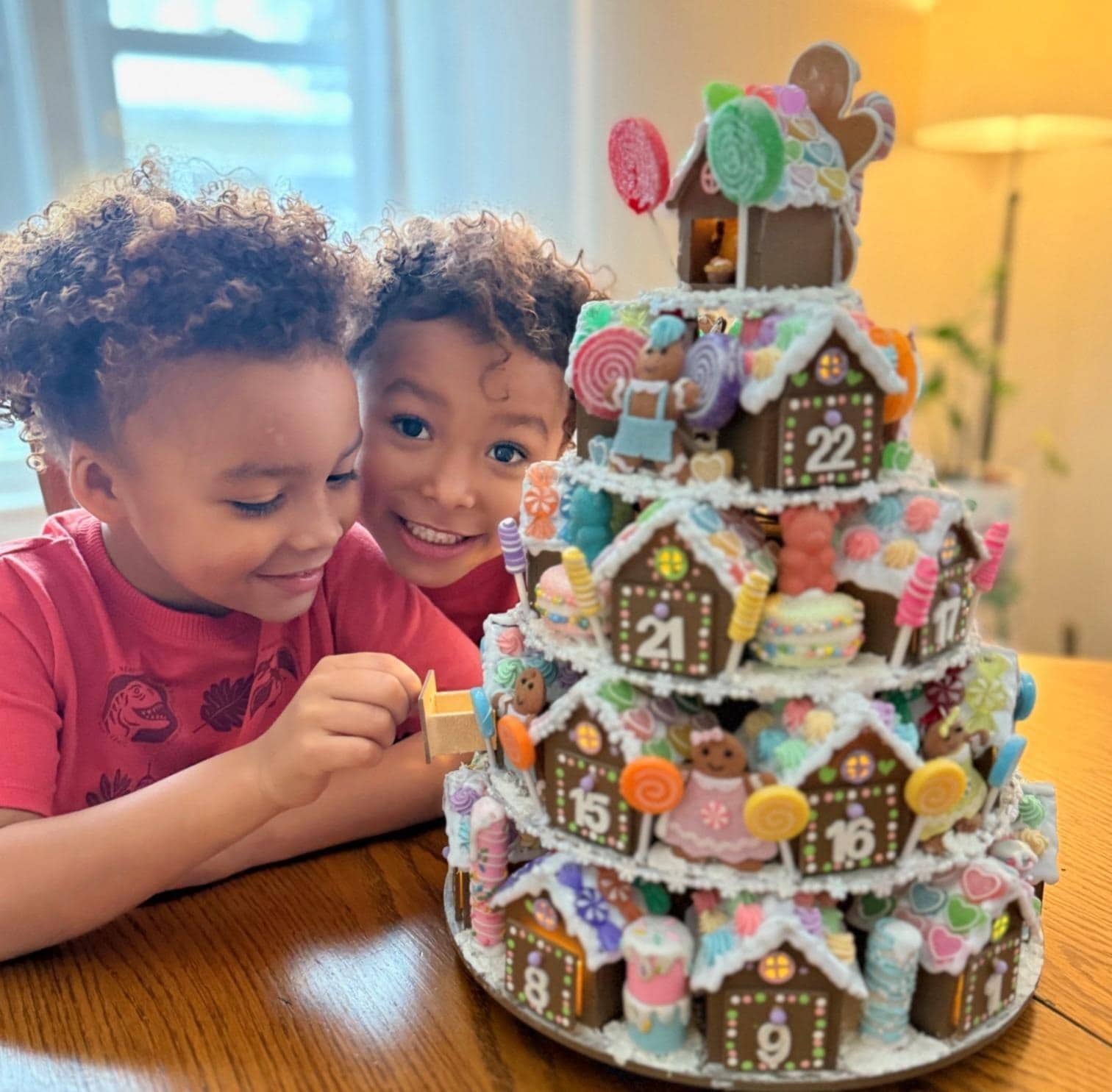 Holly’s twin grandsons play with their “Candy Castle” advent calendar.