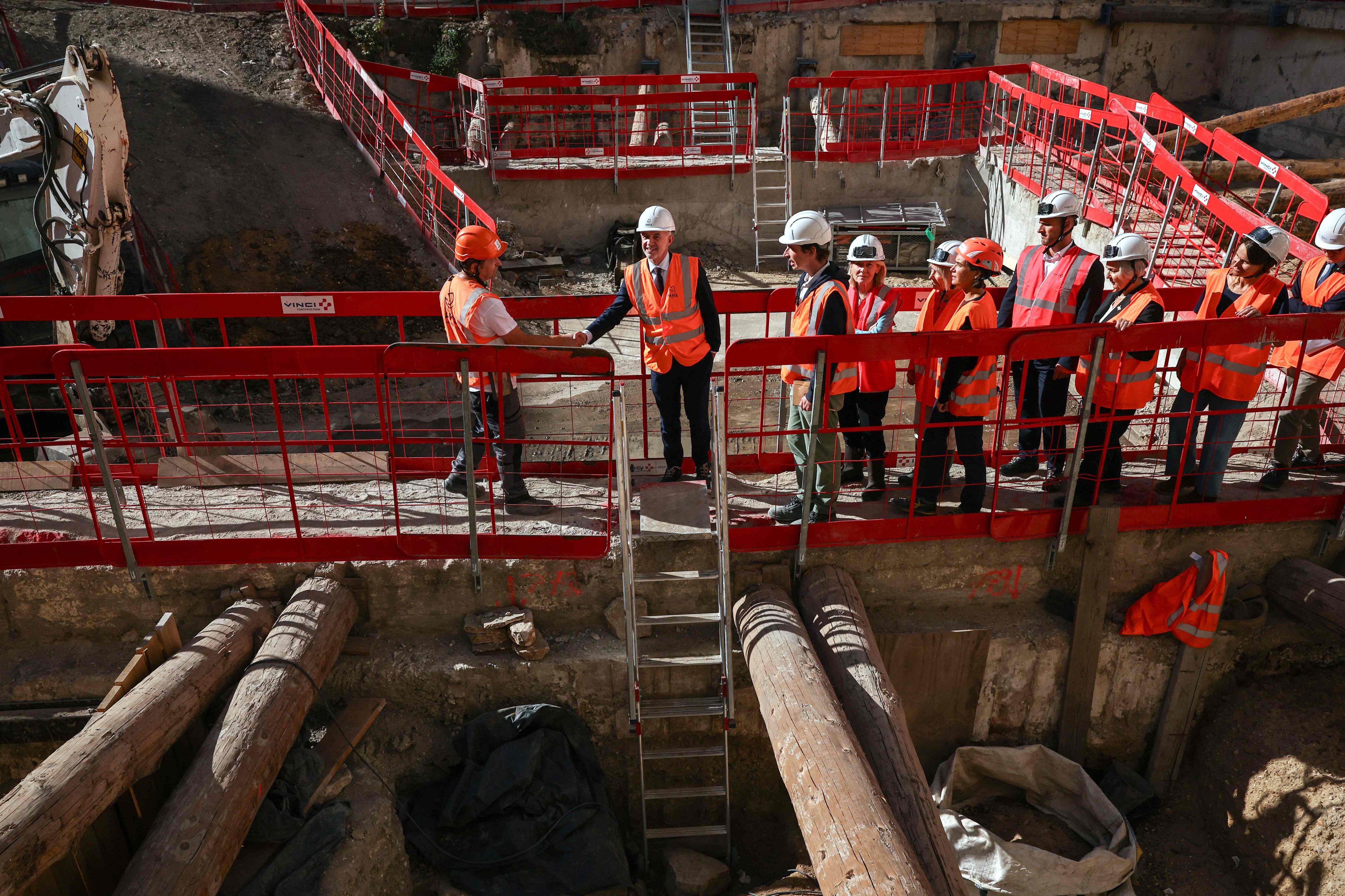 Paris mayor Emmanuel Gregoire (2nd from left) and France's culture minister Catherine Pegard (4th from left) visit the archaeological site. (AFP) Paris mayor Emmanuel Gregoire (2nd from left) and France's culture minister Catherine Pegard (4th from left) visit the archaeological site. (AFP)