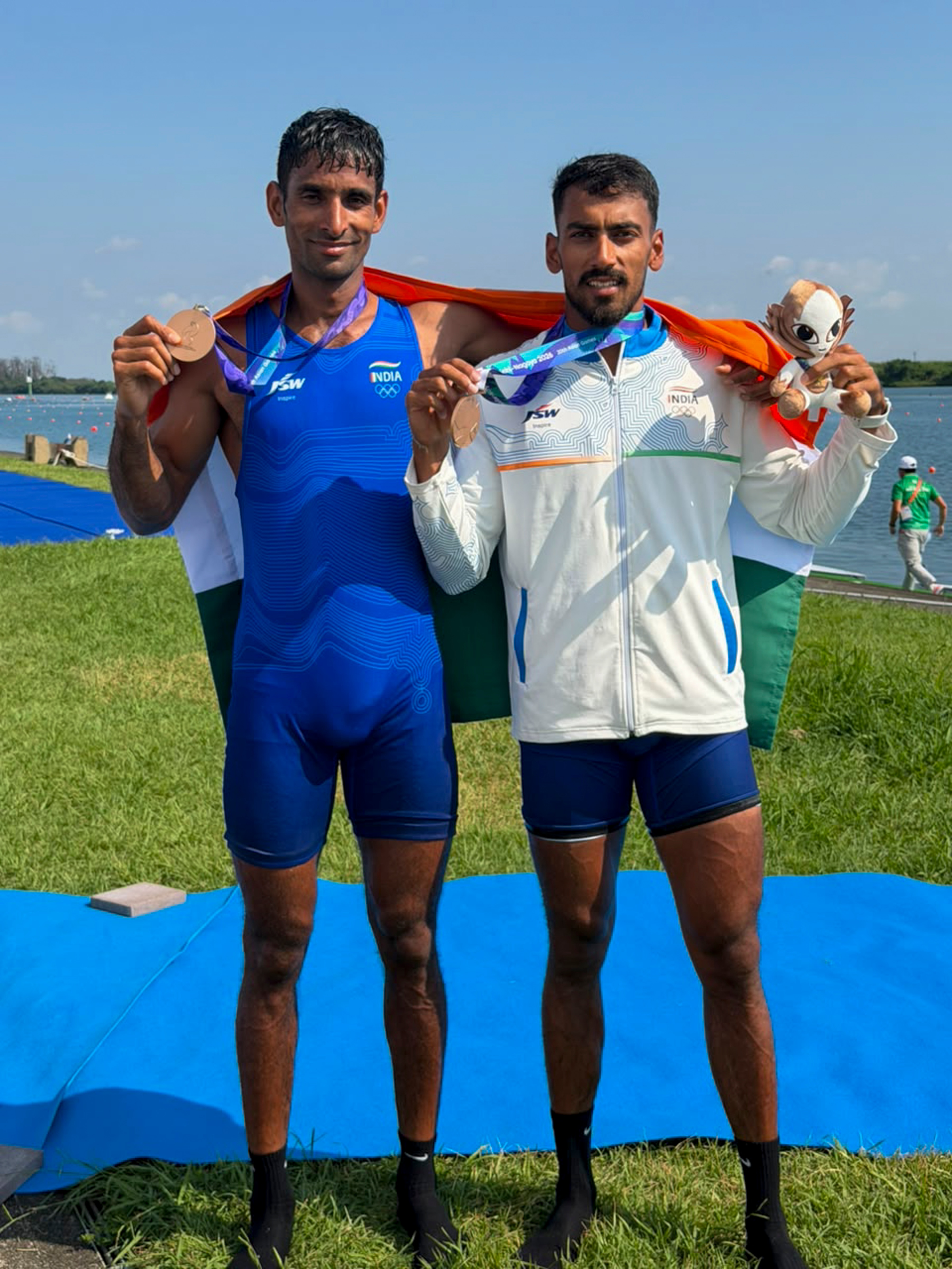 Indian rowers Satnam Singh and Salman Khan pose with their bronze medal (PTI) Indian rowers Satnam Singh and Salman Khan pose with their bronze medal (PTI)