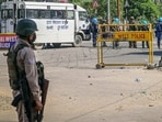 Manipur Police personnel stand guard during a general strike. (ANI)