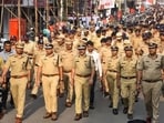 Ahead of the Ganesh Visarjan processions, the Pune police, including commissioner Amitesh Kumar (C), conducted route marches across key areas of the city on Thursday. PMC is all set for immersion of Ganesh idols on Friday by deploying 120 lifeguards and 37 fire brigade personnel at 15 immersion ghats across the city for safety purposes. (MAHENDRA KOLHE/HT)